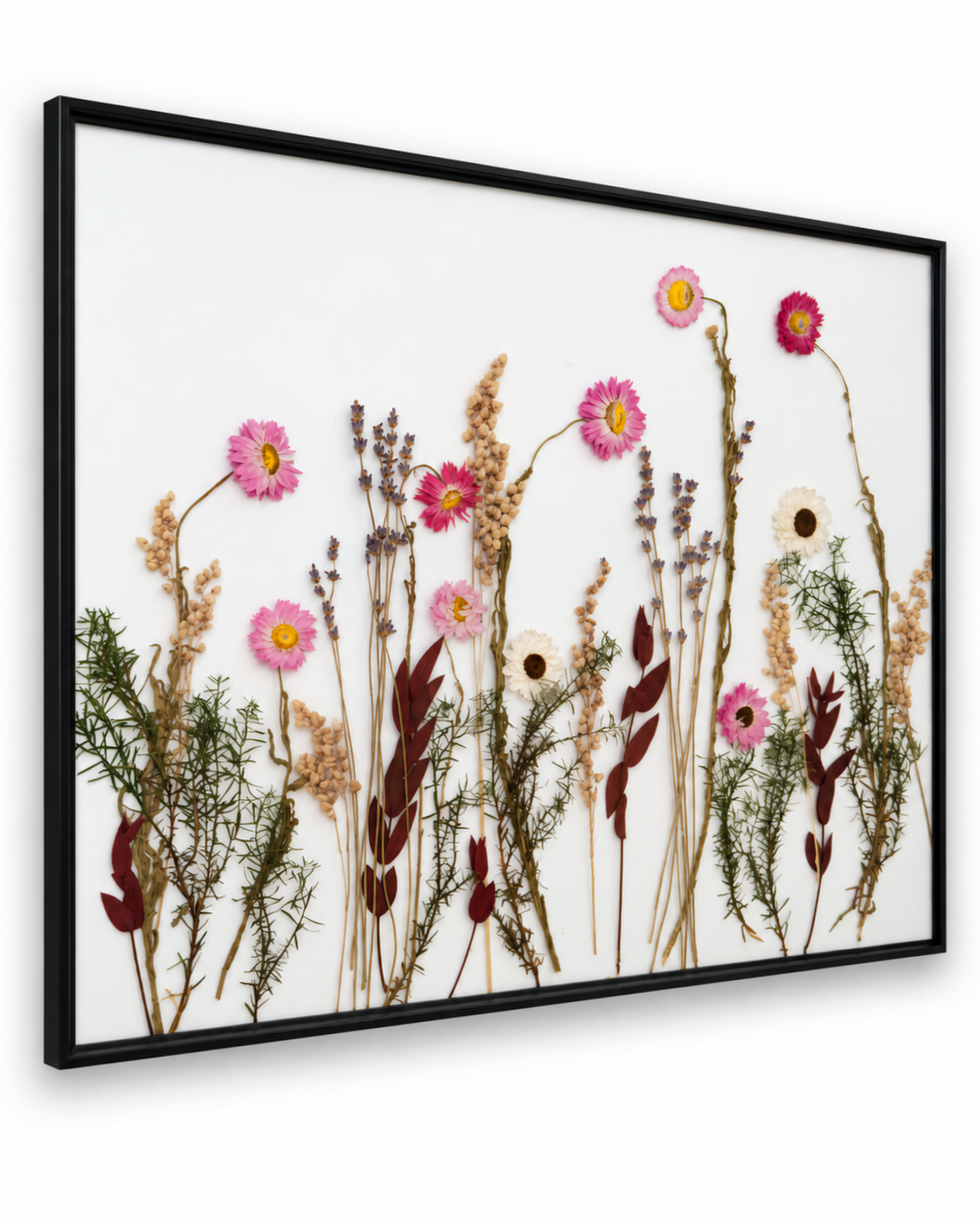 Macro detail of pressed lavender sprigs and dried flower textures inside the glass frame.
