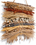 Angled perspective showing rich horizontal layers of wheat, lavender, and poppy pods.
