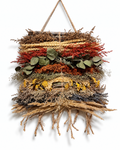 Full view of a 30x40cm handcrafted dried flower wall hanging panel with eucalyptus on a white wall.

