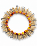Front view of a circular dried flower wall wreath with wheat, lavender, and colorful strawflowers.
