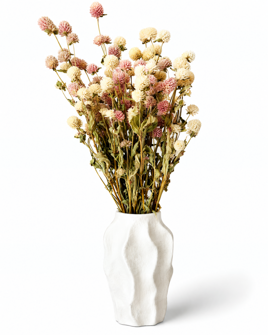 Full view of a 35-40cm mixed pink and ivory dried Gomphrena bouquet in a white ceramic vase.
